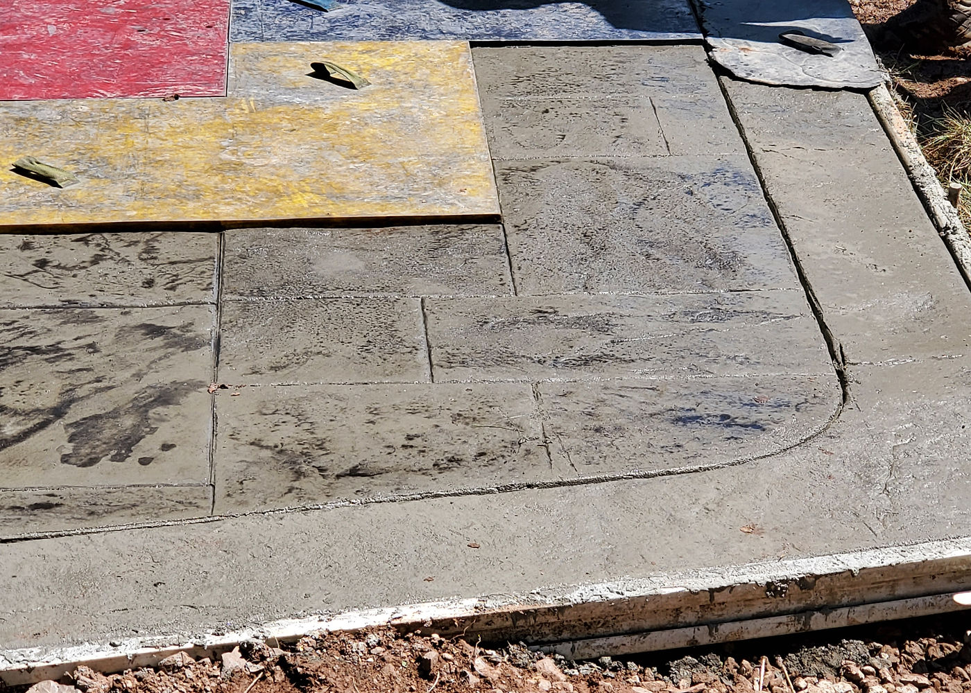 Amanda S. stamped concrete patio project by ASRE photo 8