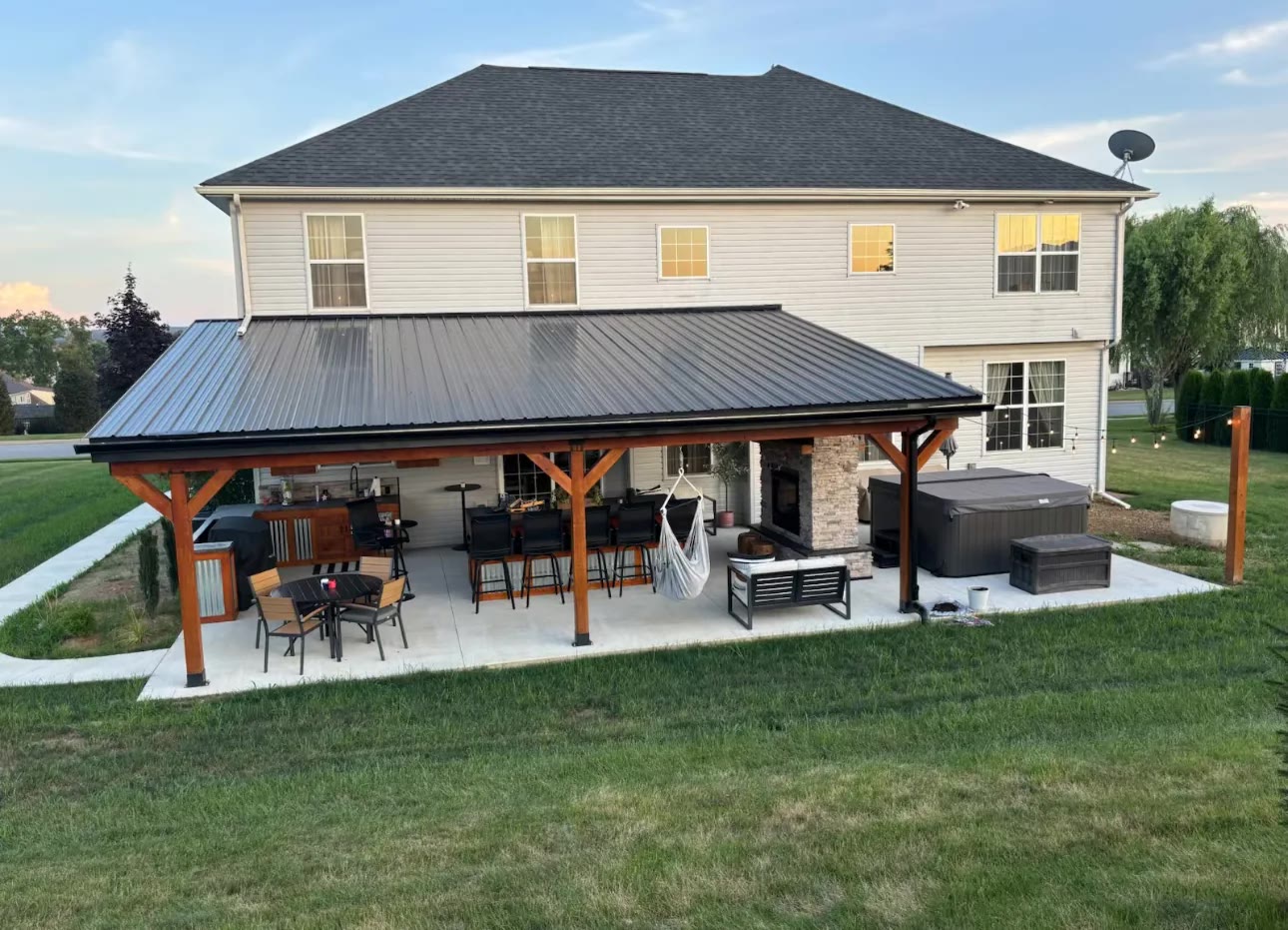 Finished covered patio and outdoor living area by ASRE