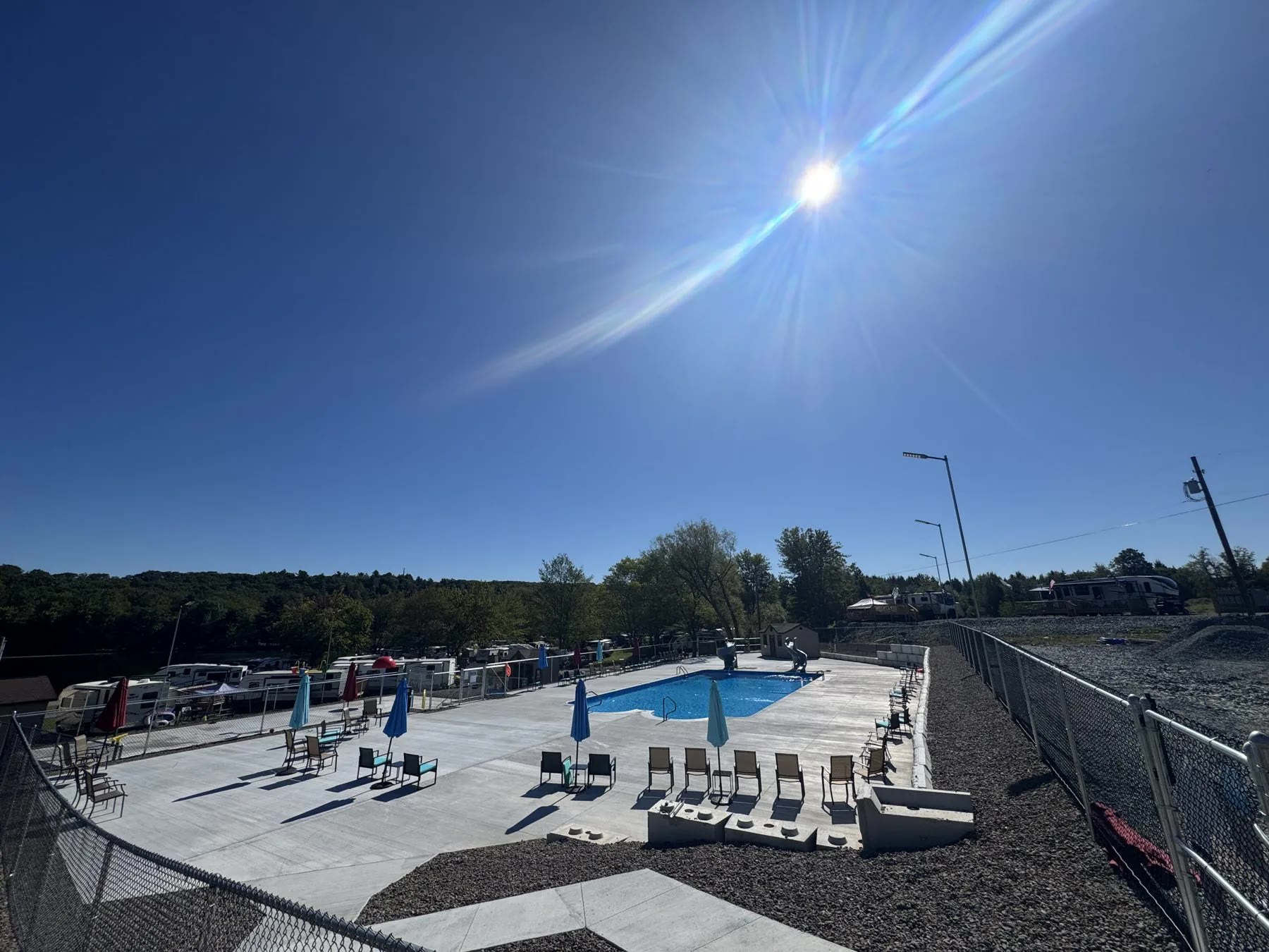 Lake commercial campground hardscaping and pool area project by ASRE photo 9
