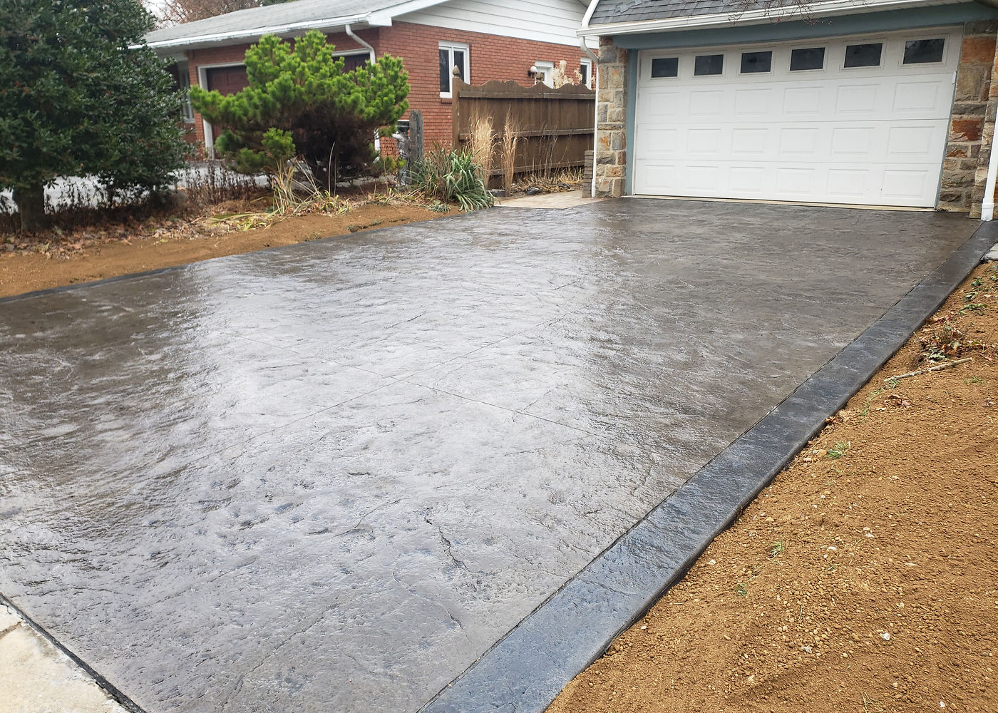 Mr. Smith driveway and concrete flatwork project by ASRE photo 1