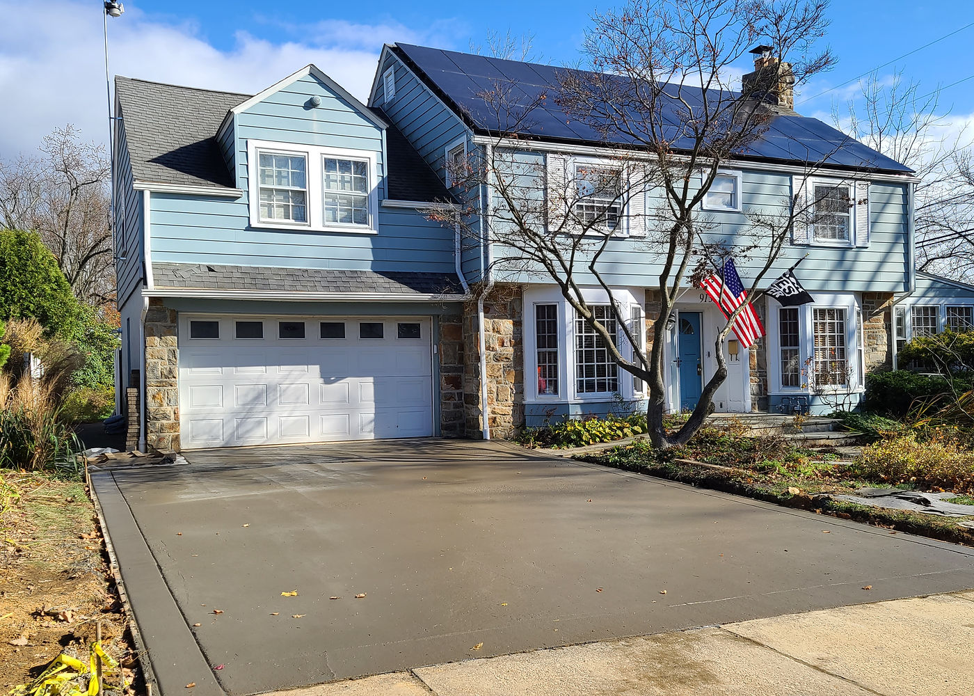 Finished concrete driveway in front of the Mr. Smith home by ASRE